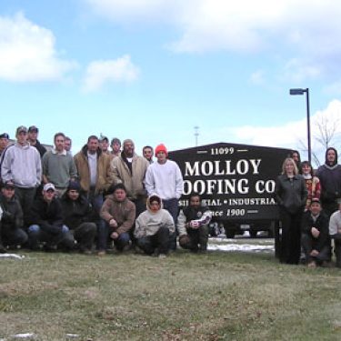 The staff of Molloy Roofing in 2005. The staff of Molloy Roofing in 2005.