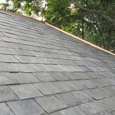 High quality re-claimed slate can provide a beautiful, lasting alternative to installation of slate purchased directly from a quarry