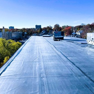 Molloy Roofing Company completed a full flat-roof replacement, upgrading with a Carlisle EPDM commercial roofing system in Cincinnati, Ohio. The scope included enhanced drainage design with tapered insulation, rebuilt box gutters, custom stainless-steel outlets, and comprehensive flashing—delivering long-term performance and reliability. Molloy Roofing Company completed a full flat-roof replacement, upgrading with a Carlisle EPDM commercial roofing system in Cincinnati, Ohio. The scope included enhanced drainage design with tapered insulation, rebuilt box gutters, custom stainless-steel outlets, and comprehensive flashing—delivering long-term performance and reliability.